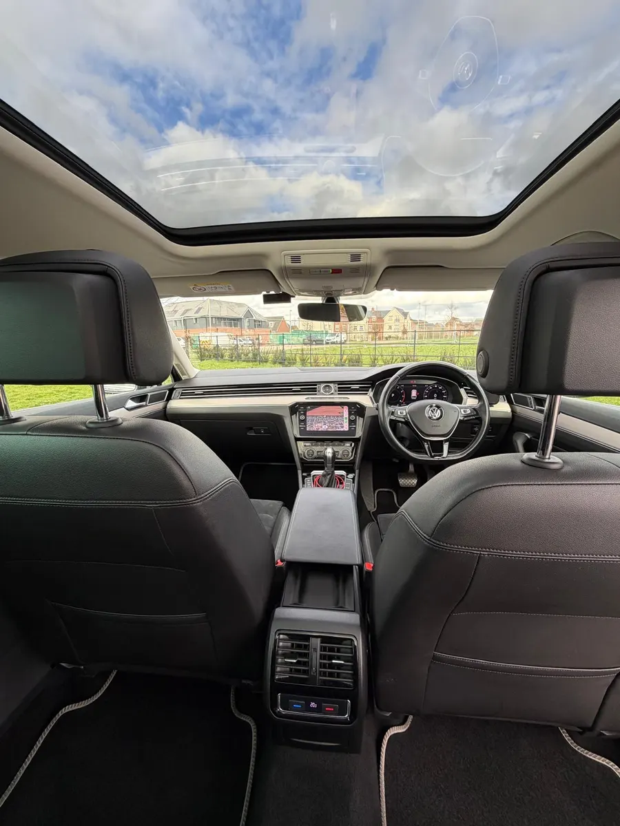 Inside one of our cars: leather seats and a panoramic glass roof